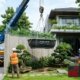 Dịch vụ cẩu hồ cá Koi composite & bàn đá tảng nguyên khối vào sân vườn biệt thự Thảo Điền, Sala